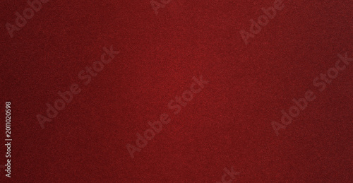 Foto Dark red textured background with velvety appearance and warm tone for modern projects