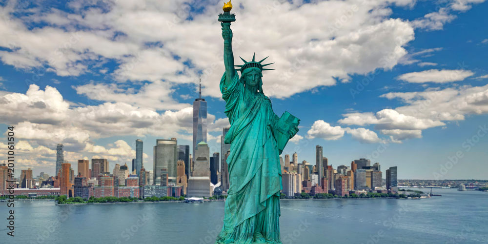 Fototapeta premium Liberty monument. New York City skyline. Liberty statue with NYC skyline. New York City banner with Liberty monument. Liberty statue and New York City skyscrapers.