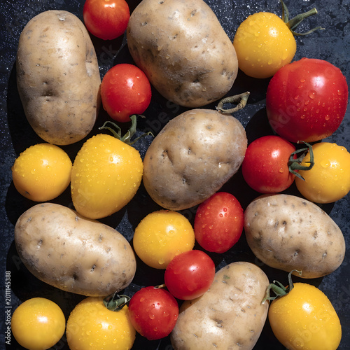 top view potatoes along with yellow and red tomato