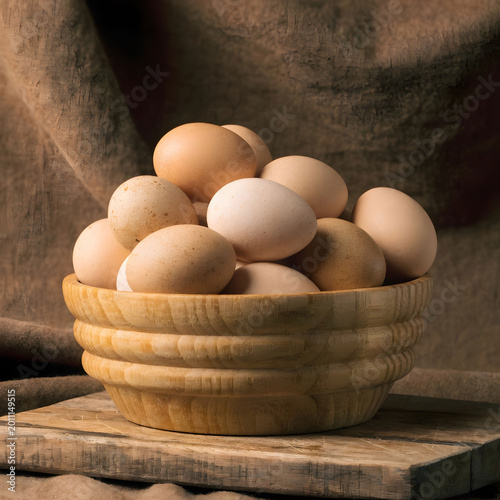 side view of fresh organic poultry farm eggs in a