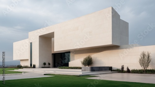 Modern minimalist architectural design featuring clean lines and elegant geometric shapes against a cloudy sky