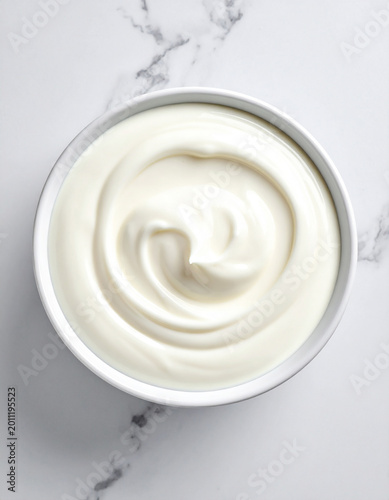 Greek yogurt in a bowl, top view