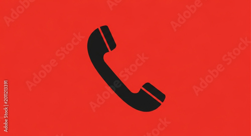 Foto Black telephone receiver icon on a red background.