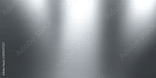 Foto A dark brushed stainless steel plate featuring a brushed silver metal texture an