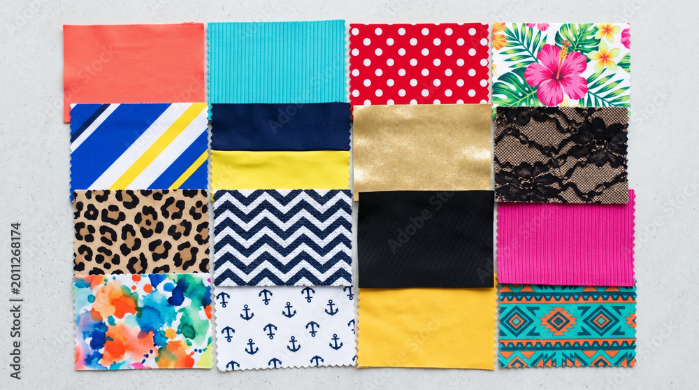 Fototapeta premium Colorful fabric swatches arranged in a grid for swimwear design 