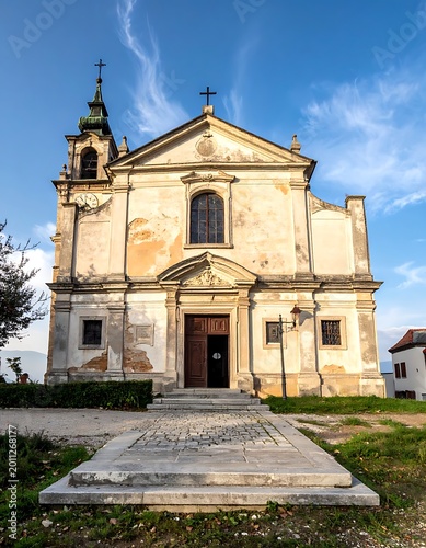 Old church building with stone steps.