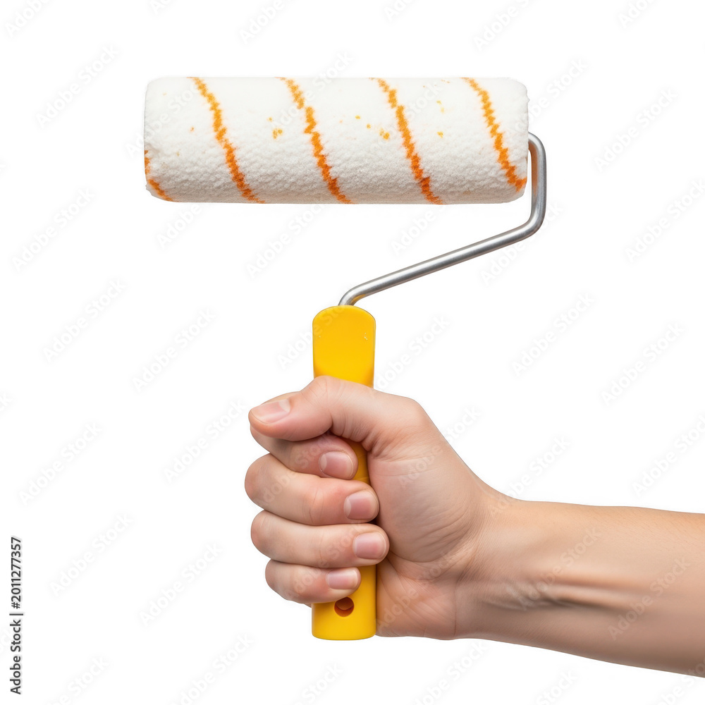 Obraz premium A hand holding a paint roller with orange and white stripes for wall painting