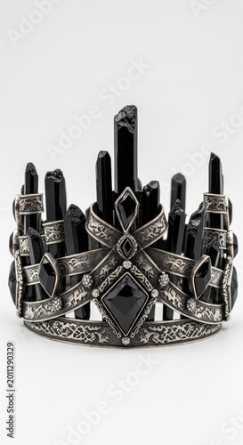 Black metal crown with spikes.