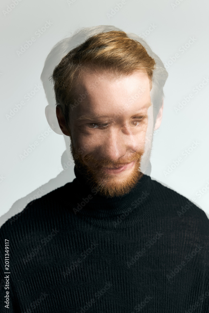 Fototapeta premium Stylish young man with dynamic expression showcasing modern fashion and charm