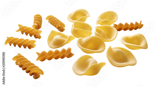 Tableau sur toile Assorted dry pasta shapes fusilli and orecchiette, isolated on transparent backg