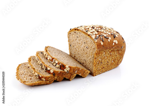 Homemade whole grain bread on a white background. Delicious bread for breakfast, lunch and dinner.