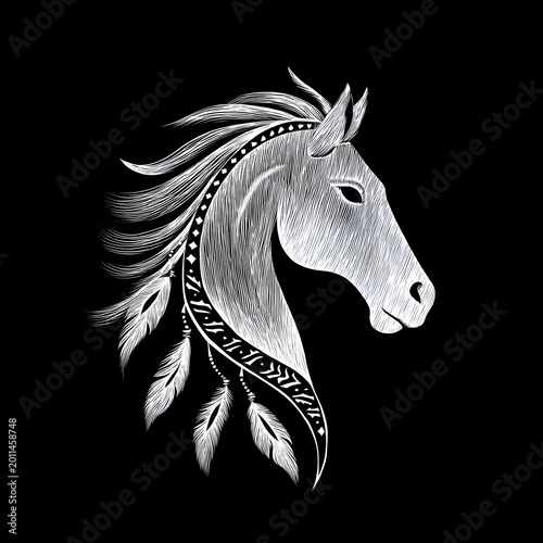 Engraving of a horse head with tribal design and detailed tribal patterns