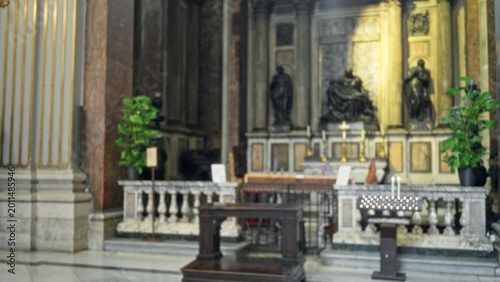 Bild auf Leinwand Grand ornate marble altar with statues and candles defocused soft bokeh church; background backdrop copyspace calm