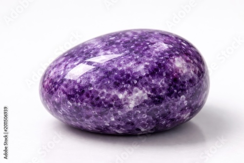 Vibrant purple polished lepidolite gem displayed on plain white surface for decorative use
