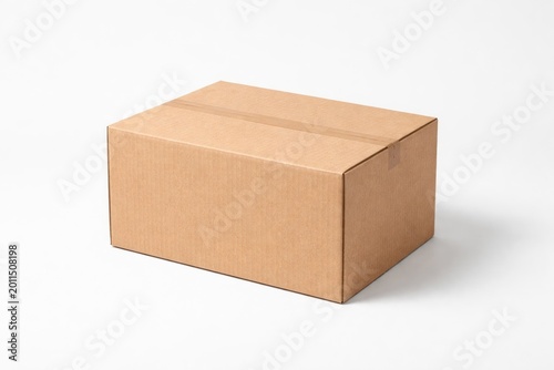 Cardboard storage box resting on uniform white background for product display