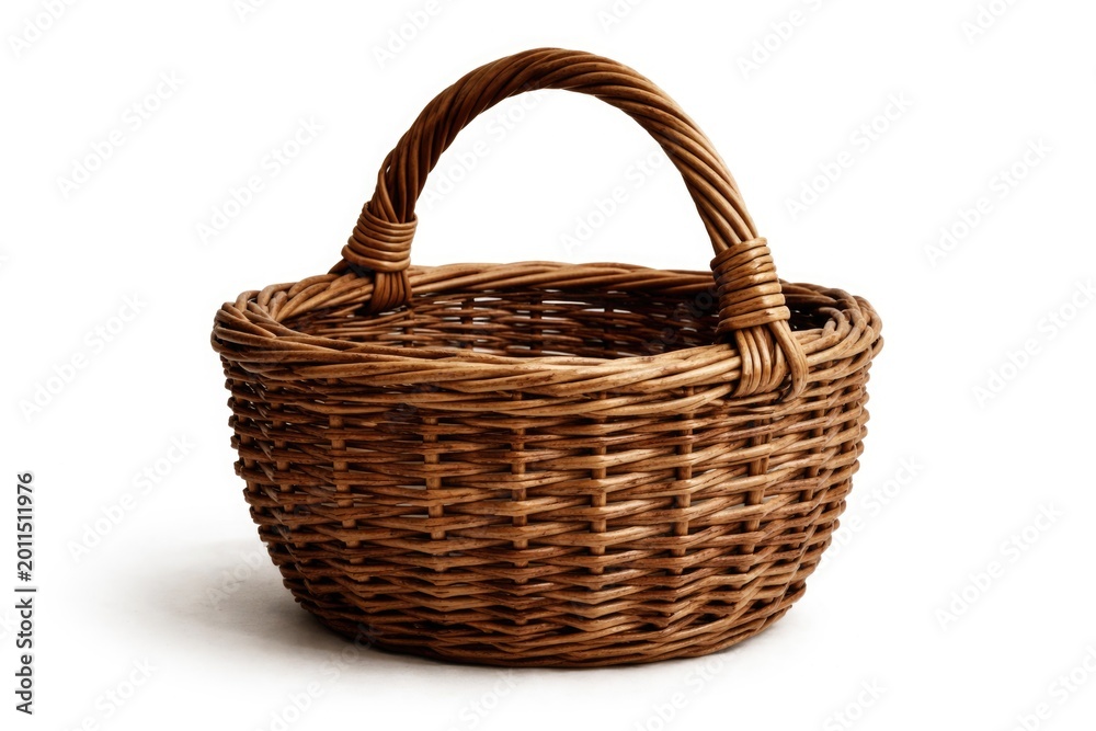 Fototapeta premium Rustic handcrafted wicker basket featured on plain white background