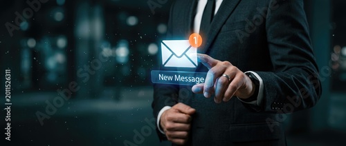 Business professional sending new message notification in urban office setting digital communication concept modern technology nighttime view