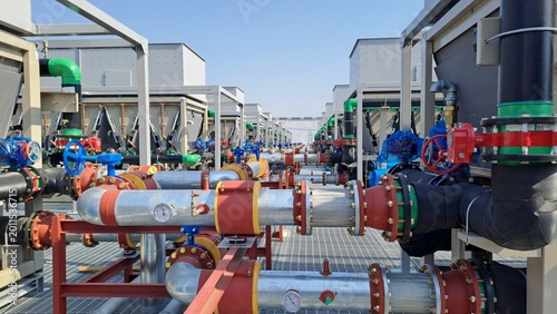 Data Center Rooftop Cooling System with Industrial Chillers, Pipes and HVAC Infrastructure