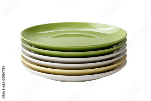 Stack of colorful ceramic plates on black background dishware tableware