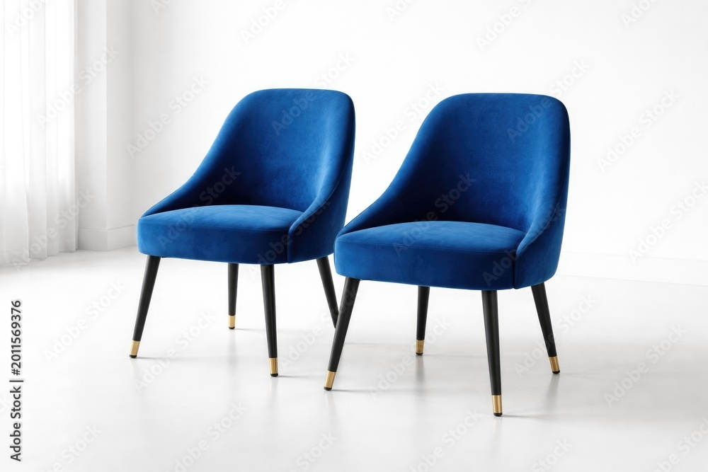 Fototapeta premium Two vibrant blue chairs arranged together on clean white floor space