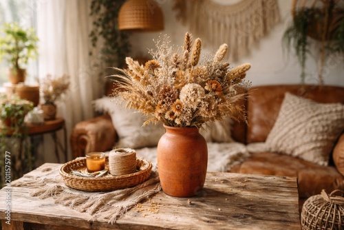 Orange vase filled with dri...