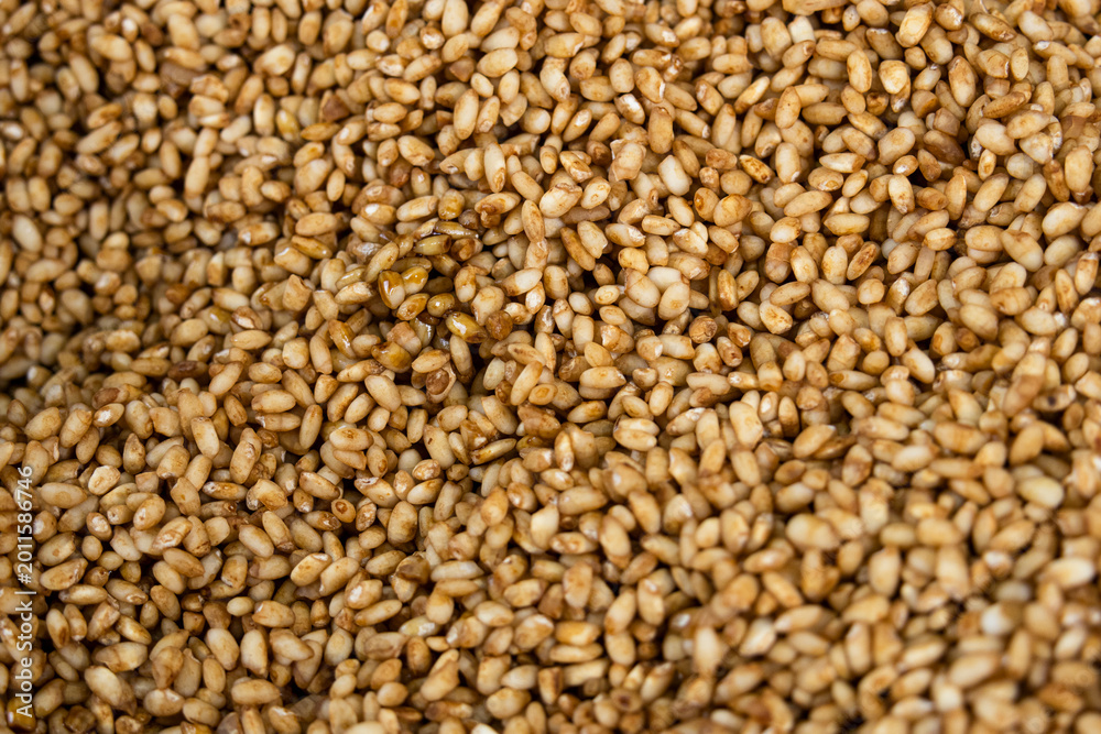 Fototapeta premium Close up texture of raw glutinous rice grains prepared for making sticky rice dumplings