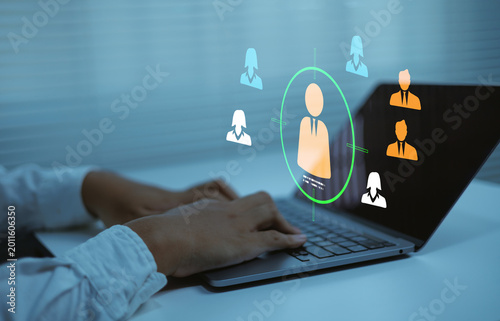 Business professional using laptop with digital HR interface, talent acquisition candidate targeting concept, recruitment analytics, workforce management, hiring employee selection process