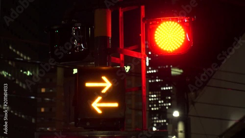 TOKYO, JAPAN - APRIL 2026 : Close up shot of crossing signal (warning light) at railway crossing. Japanese transportation, traffic and train concept video. Time lapse shot.
