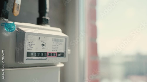 A gas meter in an apartment in a new built building during construction. Utility bills and loans for living. Household and natural resource use indicators.
