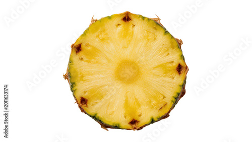 Billede på lærred Cross-section juicy yellow pineapple with green core and rind