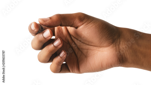 Photos Dark skinned hand holding something small, isolated on transparent background