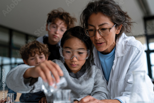 Dedicated Teacher Guiding Children Through Science Experiment, Collaborative Classroom Learning Scene, Curiosity Discovery and Teamwork, Bright Educational Environment with Authentic Modern School