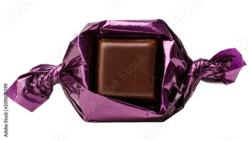 Cuadro en lienzo Square dark chocolate candy in shiny purple foil wrapper, isolated on transparen