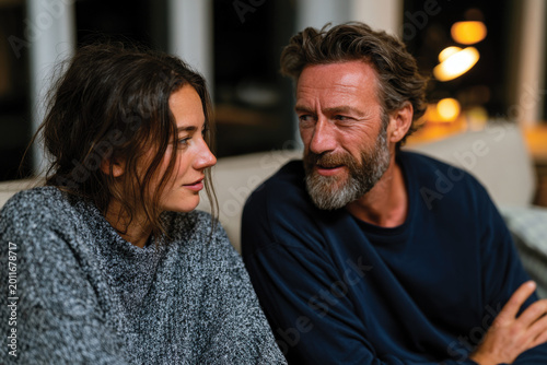 Father and Daughter Sharing Intimate Moment on Couch, Emotional Connection and Understanding, Warm Cozy Indoor Setting, Soft Natural Light, Authentic Lifestyle Scene