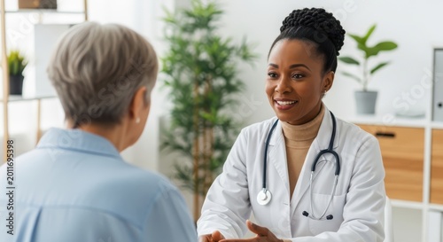 Smiling african american female doctor in white coat talking to patient
