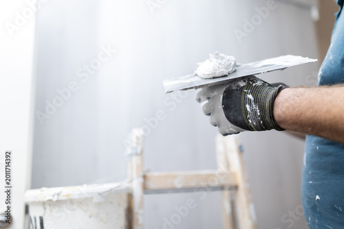 Plaster Compound on Trowel During Interior Repair