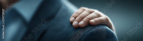 Support encouragement hand shoulder business teamwork trust comfort motivation closeup emotional professional human touch