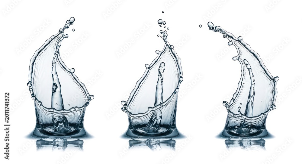 Obraz premium Three dynamic liquid splashes frozen mid-air