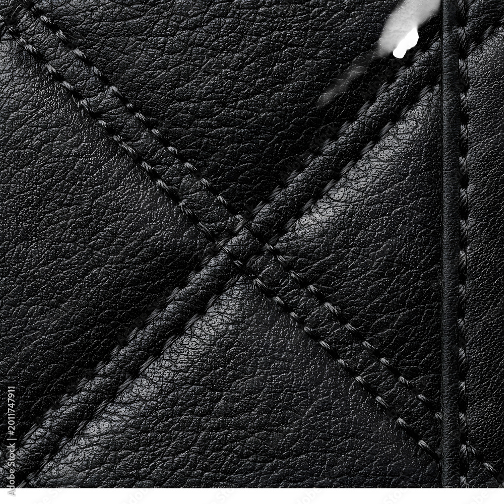 Fototapeta premium Macro Photography of Premium Quilted Black Leather Texture with Detailed Stitching Pattern