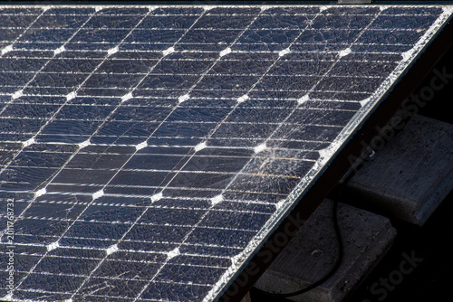 Bild auf Leinwand Damaged Solar Panel Surface with Visible Cracks,Broken Photovoltaic Panel After