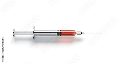 Medical syringe filled with red liquid
