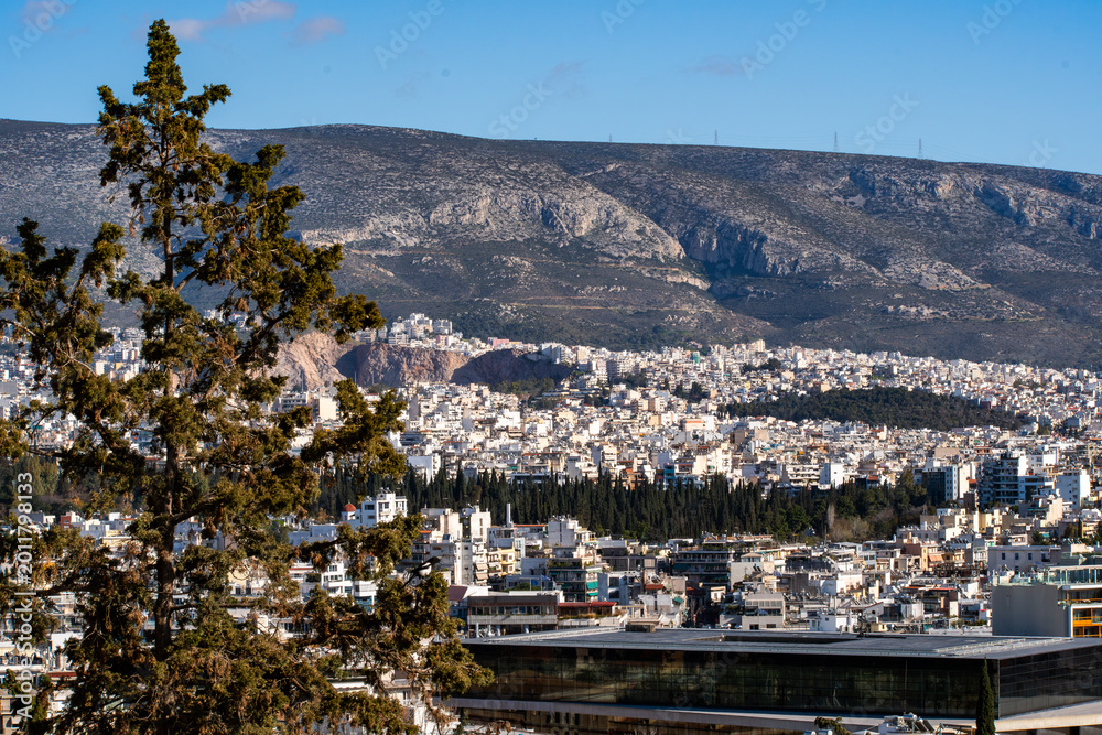 Obraz premium Cityscape view of Athens, Greece as seen from the top of the Acropolis of Athens site.