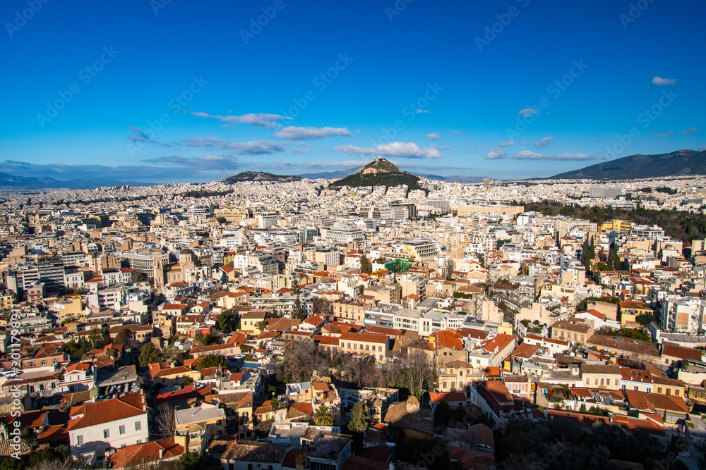 Fototapeta premium Cityscape view of Athens, Greece as seen from the top of the Acropolis of Athens site.