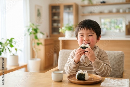 Japanese Boy Enjoying Eating Onigiri Rice Ball, healthy meal time