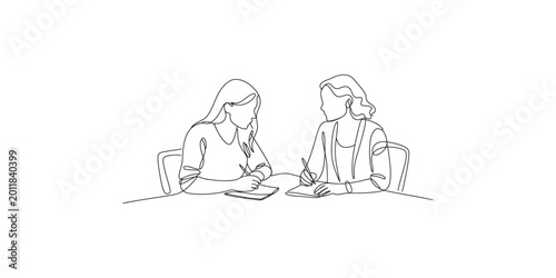 Continuous line drawing of two women sitting at a table working on documents together in an office setting with a simple white background