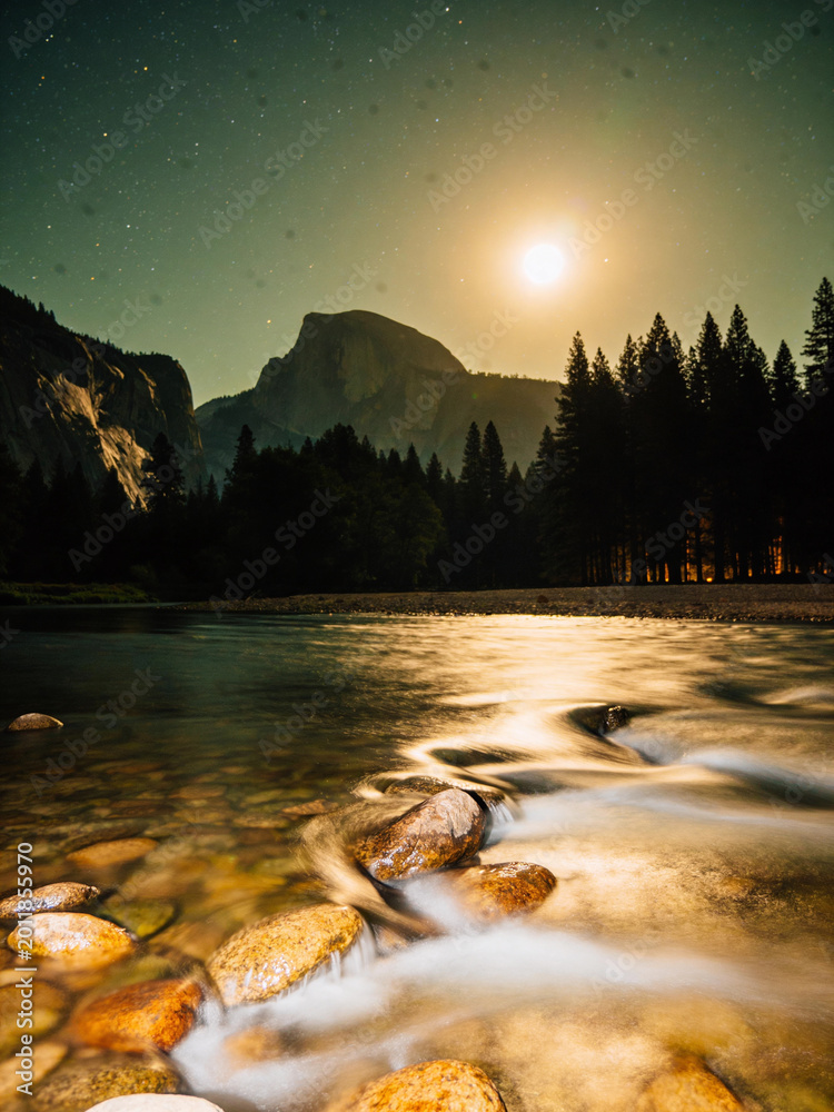 Naklejka premium Majestic Granite Peaks and Rushing River Surge