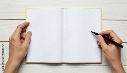 Creative writing practice home office desk blank notebook minimalist environment top-down view inspiration and ideas