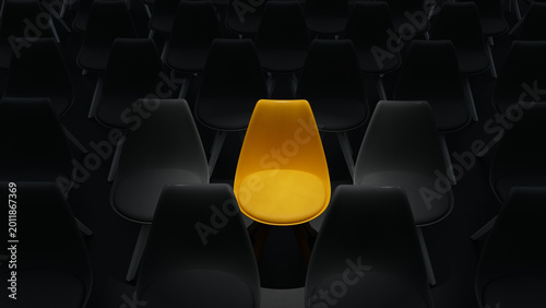 Foto Single Bright Yellow Chair Among Rows of Dark Grey Seats Representing Uniqueness and Individuality