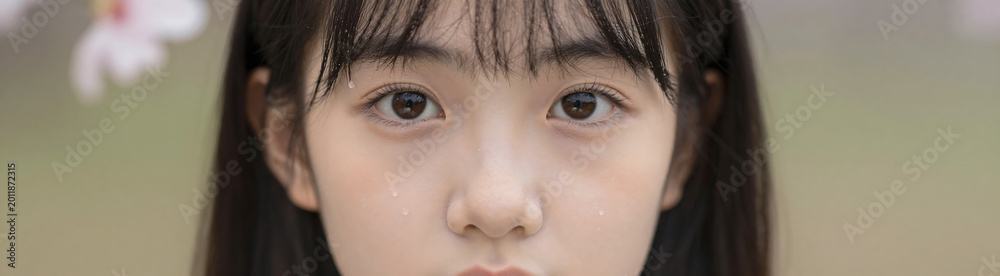 Fototapeta premium young girl face centered tight surrounded delicate petals tiny droplets water glistening soft natural