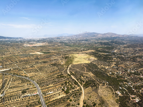 Aerial view of rural landscape and mountains near Spata area, Attica, Greece.
